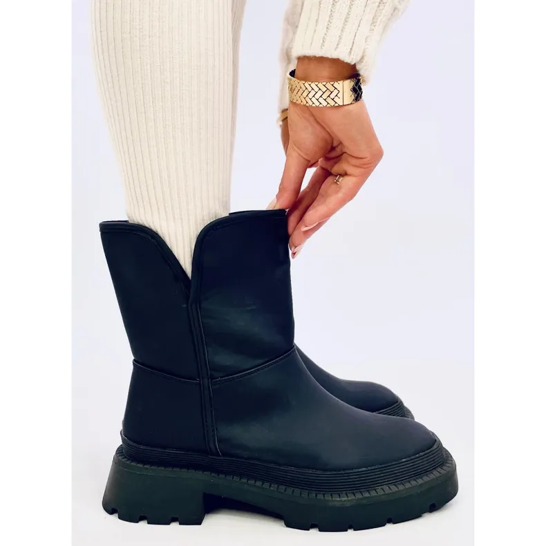 Lizzo Black snow boots