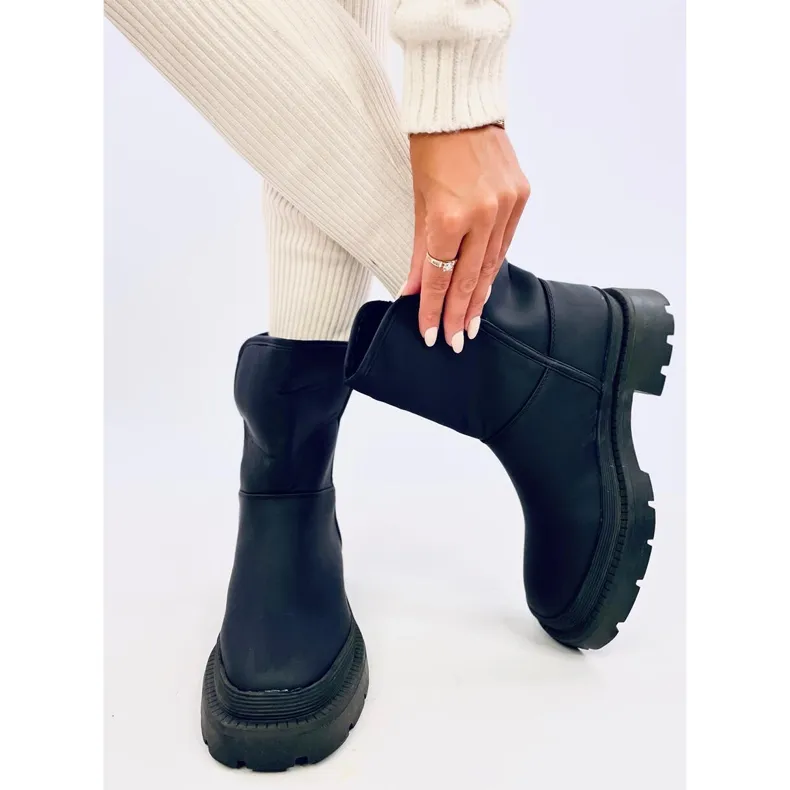 Lizzo Black snow boots