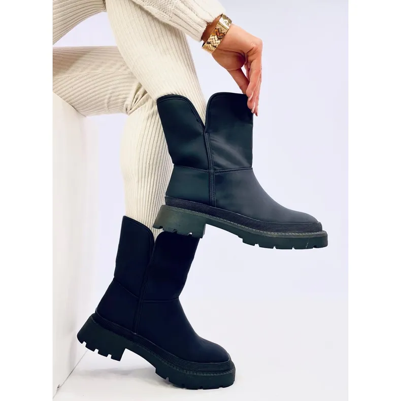 Lizzo Black snow boots