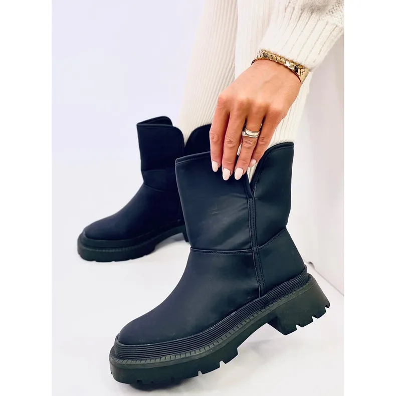 Lizzo Black snow boots